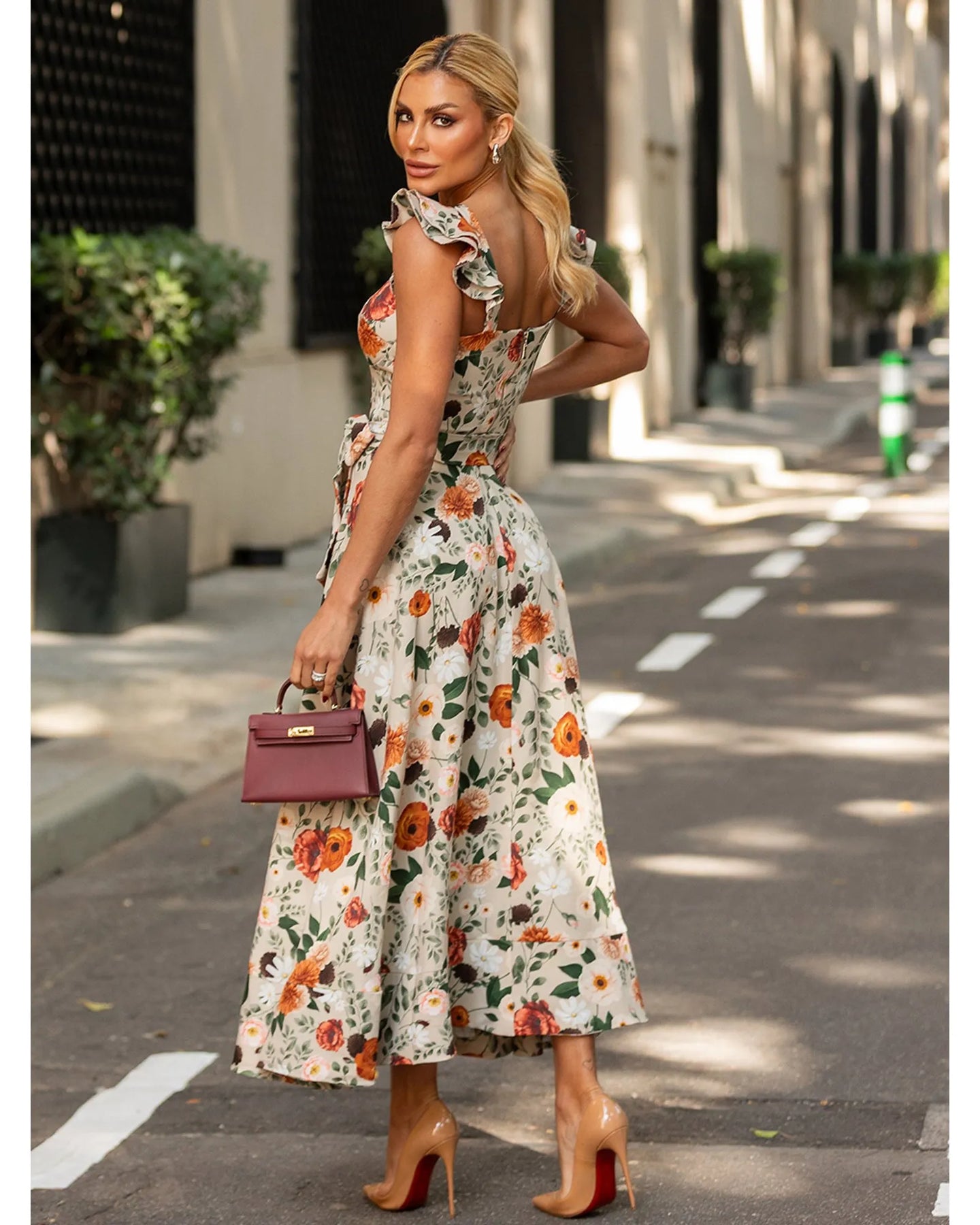 midi dress Lemon Blossom Dress Teuta Matoshi Casual dresses A row of decorative buttons curve down the front of this satin midi dress finished with elegant draping for a flattering fit. Alie Street Luna Midi Dress